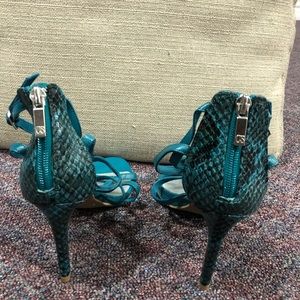 Brand new! Snakeskin heels.